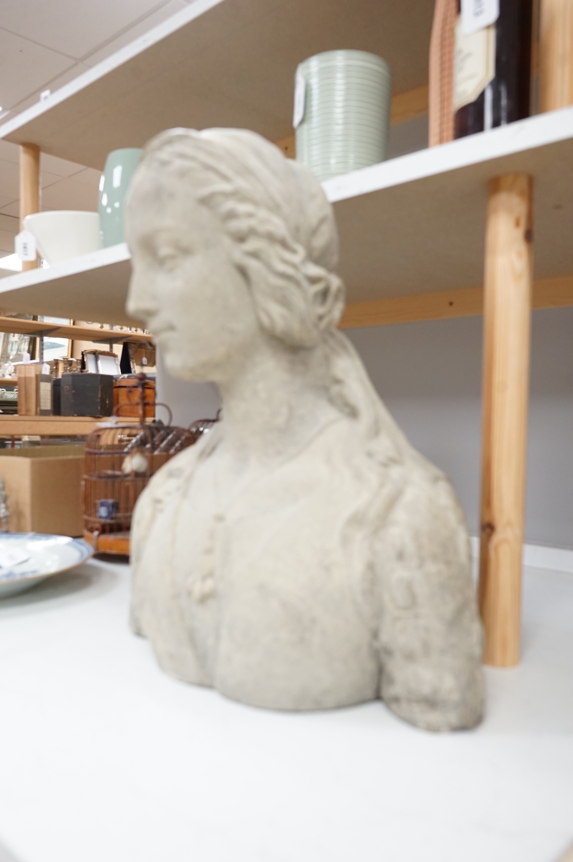 A composition stone bust of Madonna, 48cm high